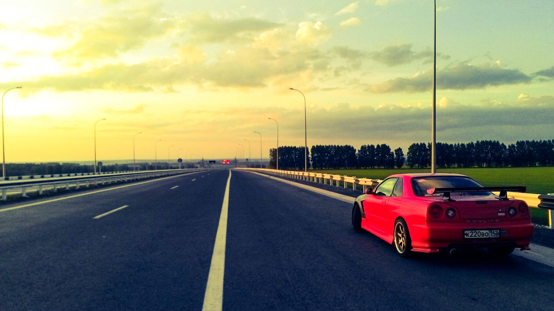 ניסאן סקייליין GTR R34 שקיעה על הכביש טפט