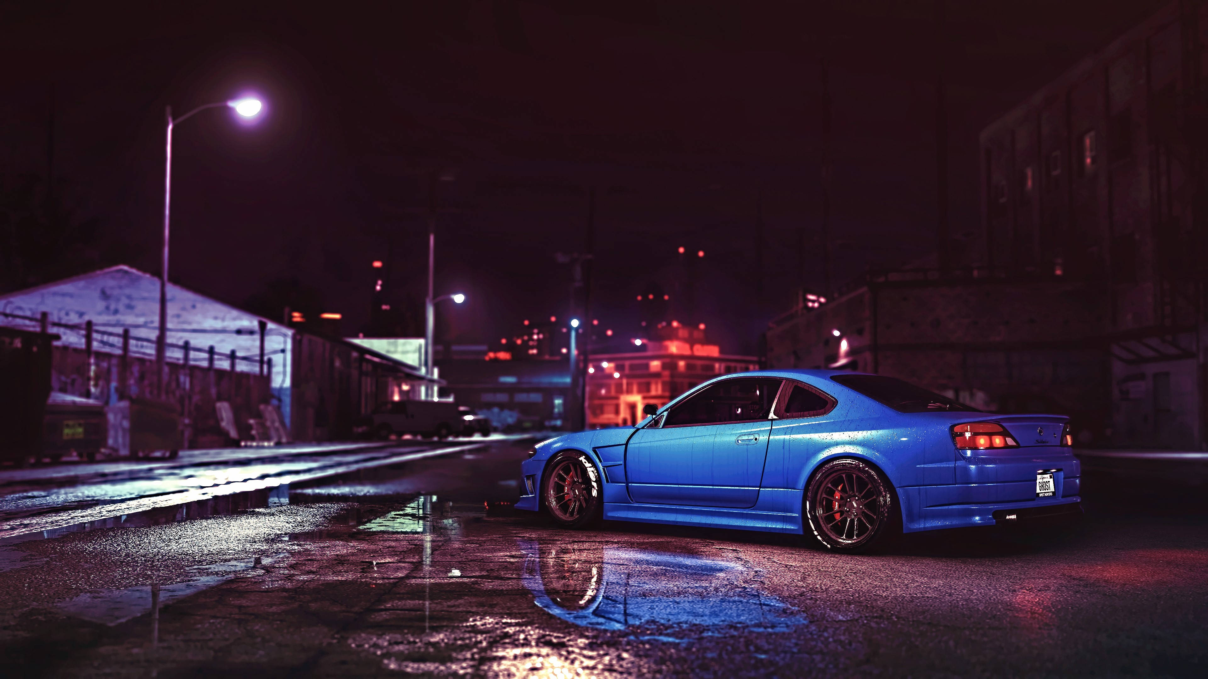 מכונית JDM כחולה מדהימה זוהרת תחת שמי הלילה טפט
