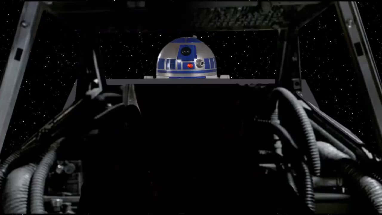 רקע זום של מלחמת הכוכבים R2D2 בחלל טפט