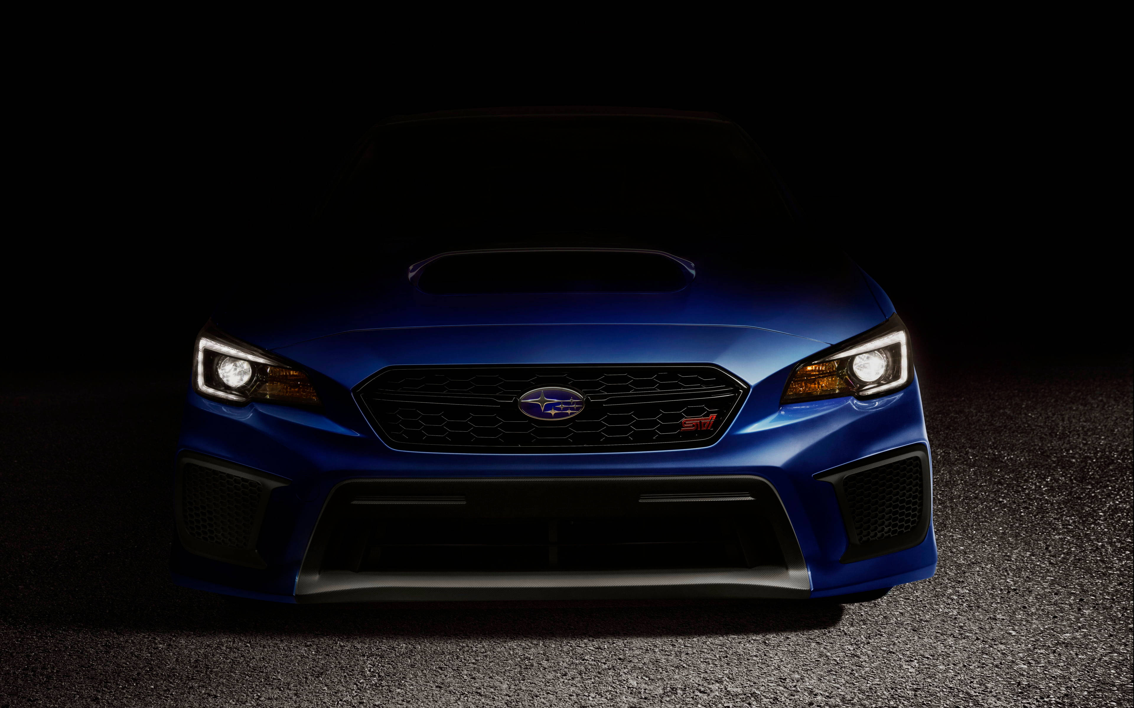 תמונה מרהיבה ב-4K של סובארו WRX STI בתנועה טפט