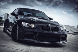 תמונת מכונית BMW שחורה 4K למחשב נייד